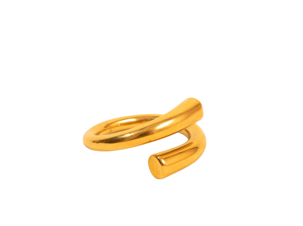 Sophisticated gold ring with a modern, minimalist design, ideal for everyday wear or as a statement piece.