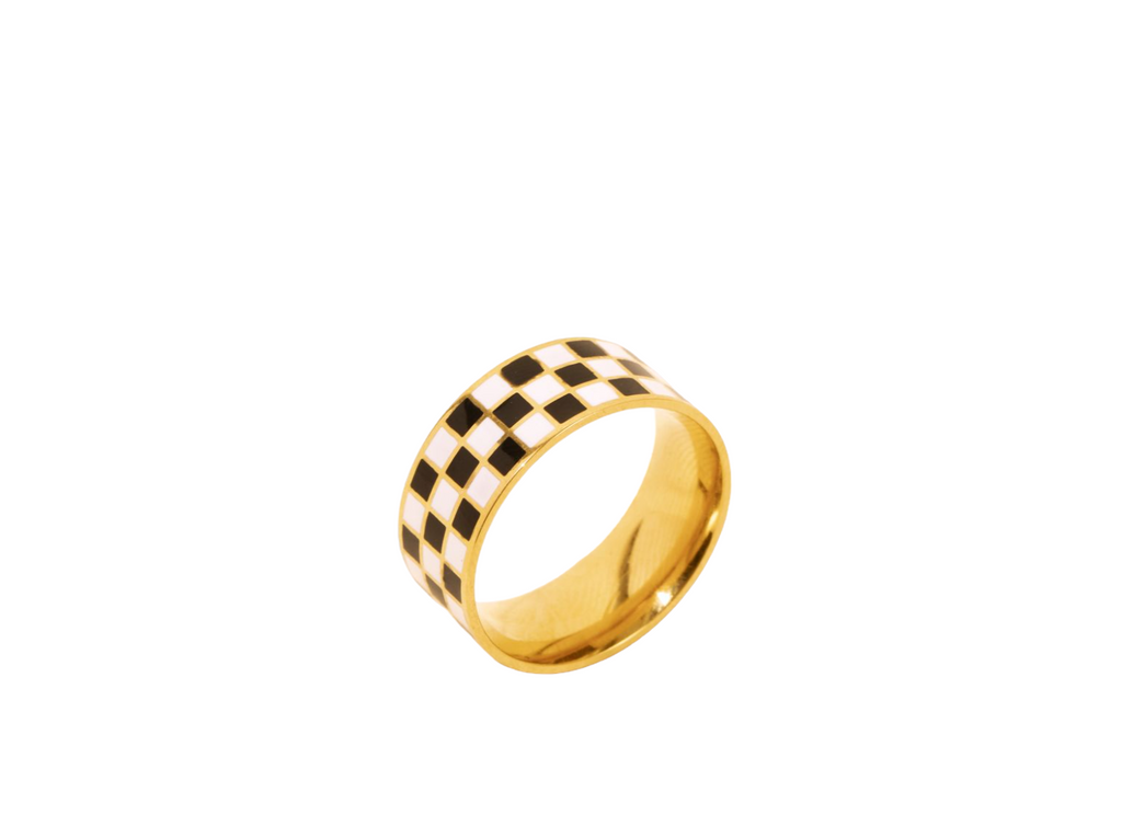 Unique black checkered ring with a bold, geometric design, perfect for a contemporary fashion statement.