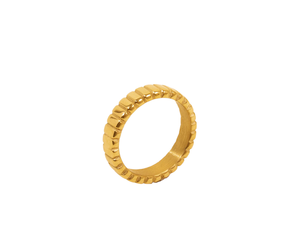 Elegant gold-lined ring featuring a sleek design, perfect for stacking or wearing alone. Ideal for special occasions or everyday elegance, this unique piece adds a touch of luxury to any outfit.