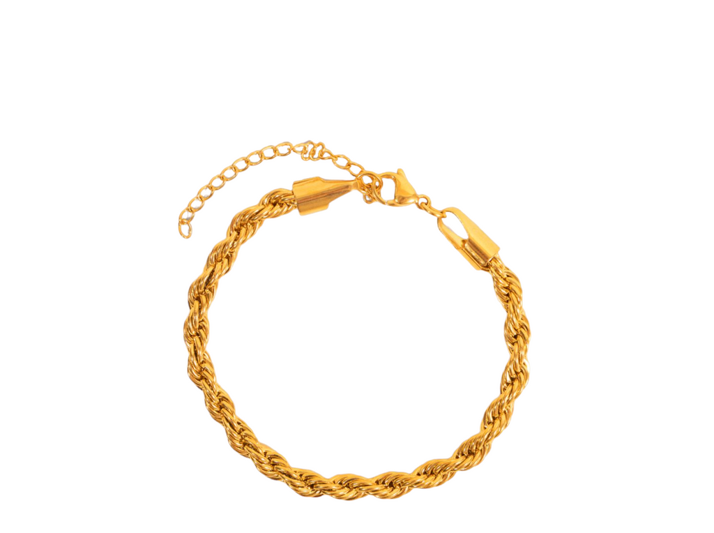 Twisted gold bracelet featuring a unique design, ideal for adding elegance and sophistication to any outfit. Perfect for casual or formal occasions, this handmade accessory enhances your jewelry collection.